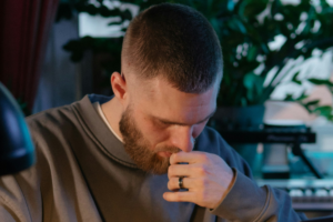 a man thinking about drug and alcohol rehab in menifee CA