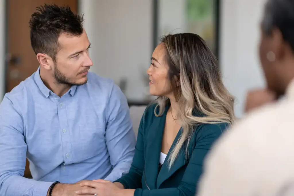 male client together with a support group at a drug and alcohol rehab