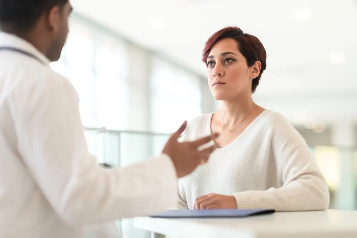 a female client with a male doctor during medical detox