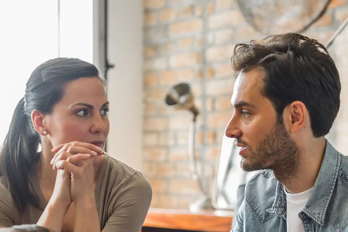 Couple having serious talk at home