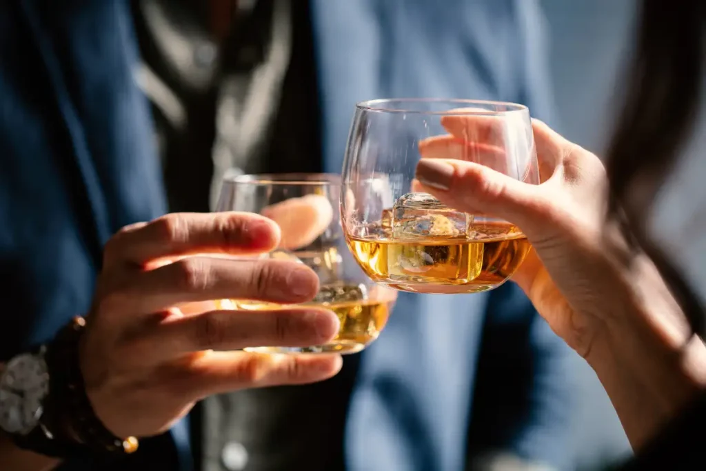 a couple drinking alcohol together